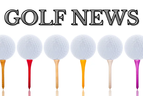 Golf News with Golf Balls on Tees